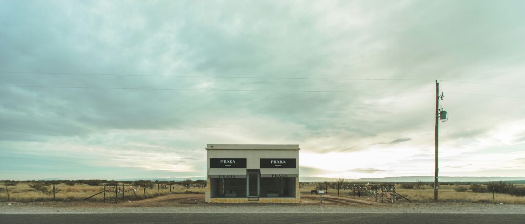 A photo of what looks like a Prada store, in the middle of the Chihuahua Desert